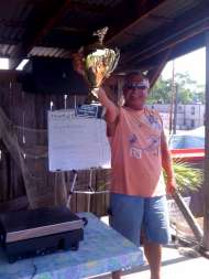 Captain Marv of Evil Eye Charters at the scales wins the 2010 NCCBA Lake Erie Walleye Fishing Tournament